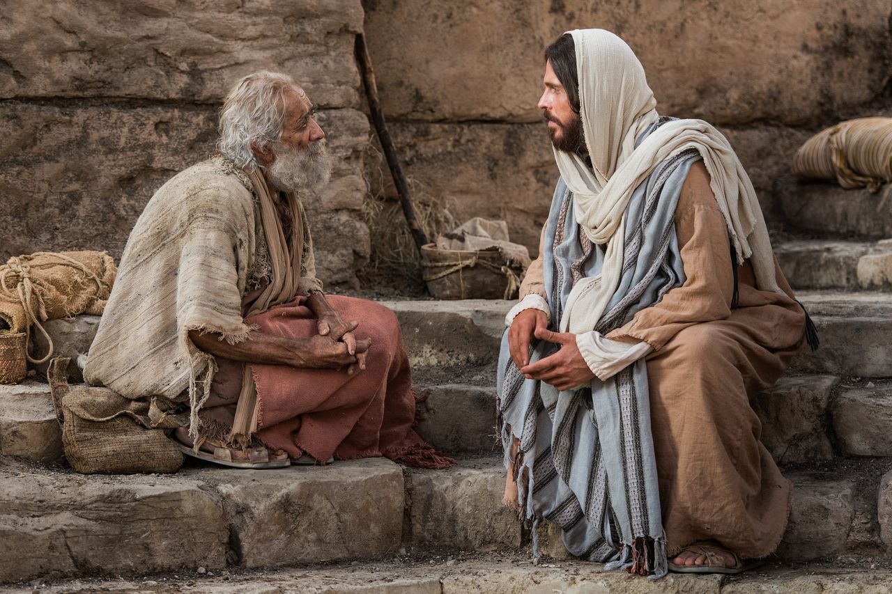 Jésus-Christ s’assied à la piscine de Béthesda et parle avec un homme qu’il a guéri